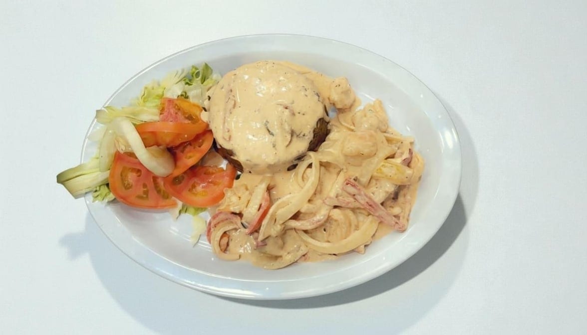 Mofongo Con Pechuga De Pollo a La Crema.